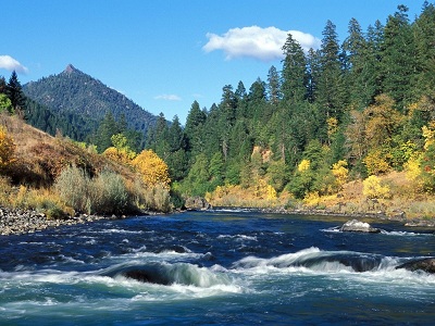 tall peaks and lush vegetation grace the rogue river of southern oregon